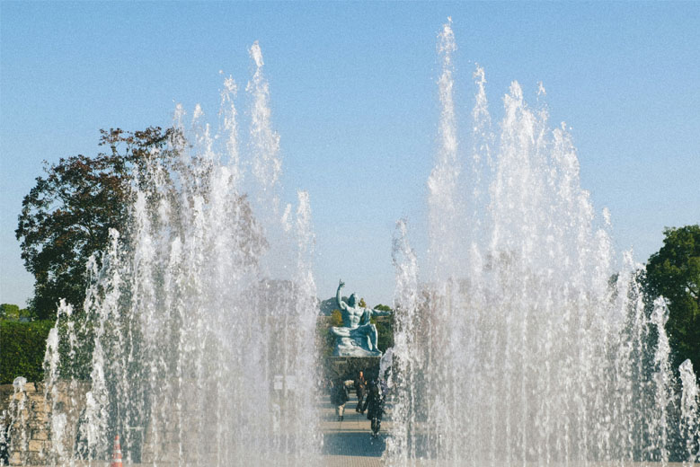 Fountain of peace, with the Peace statue centered, in the Nagasaki Peace Park, Nagasaki Prefecture