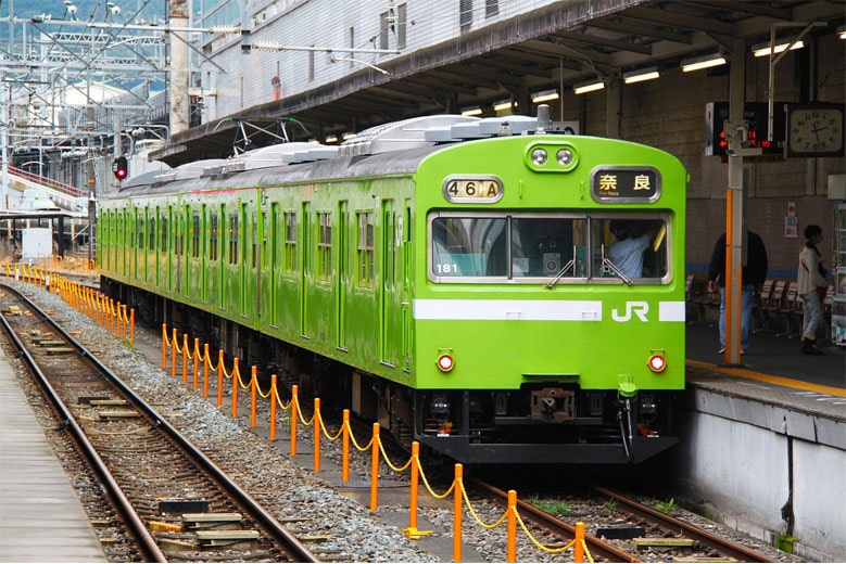 Green JR train on the Nara Line. How to save money travelling around Japan