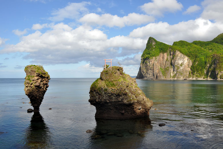 The Ebisu Rock and Daikoku Rock standing in the water