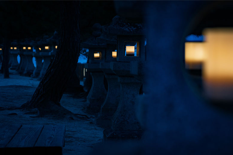 Miyajima stone lanterns at night